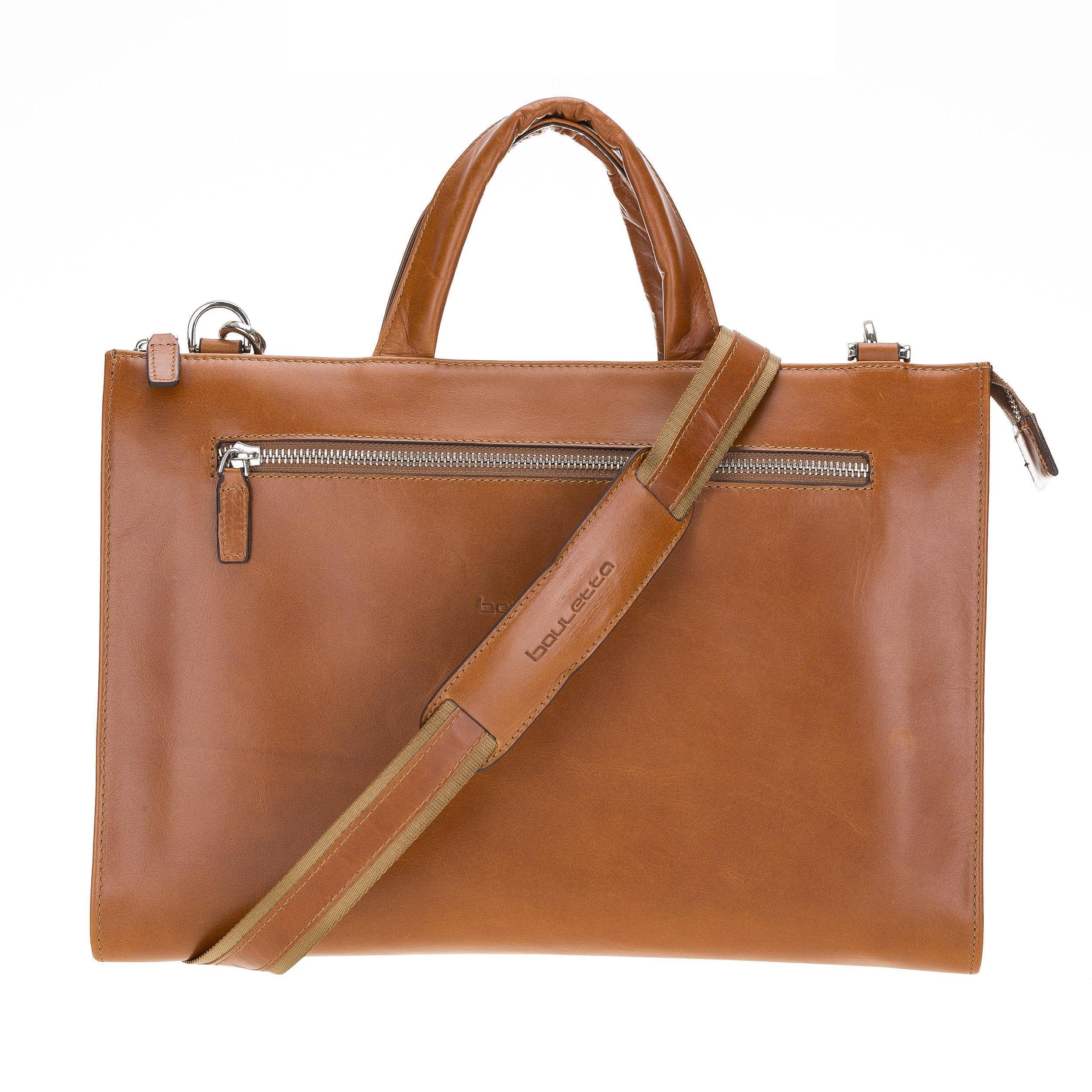 Canzo Leather Notebook Bag made from 100% genuine calf leather, featuring a zippered main compartment and adjustable shoulder straps.