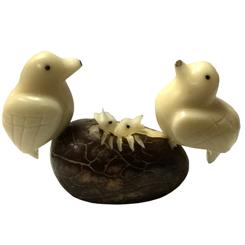 Hand-carved Caring Doves Tagua Nut Figurine showcasing intricate details and natural colors, symbolizing sustainability and craftsmanship.