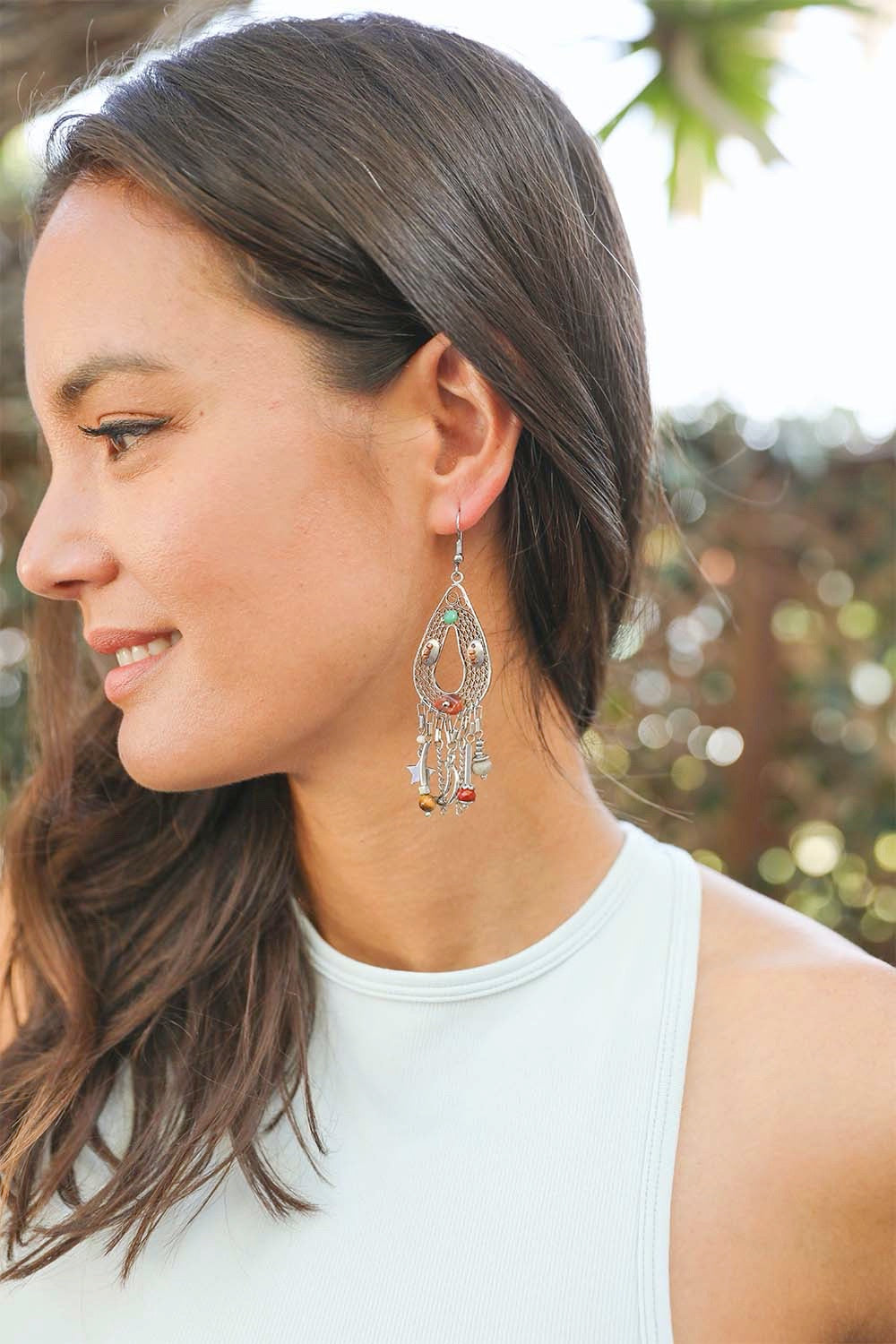 A pair of elegant Carnelian Stones Beaded Earrings showcasing vibrant orange-red stones on a delicate beaded design.