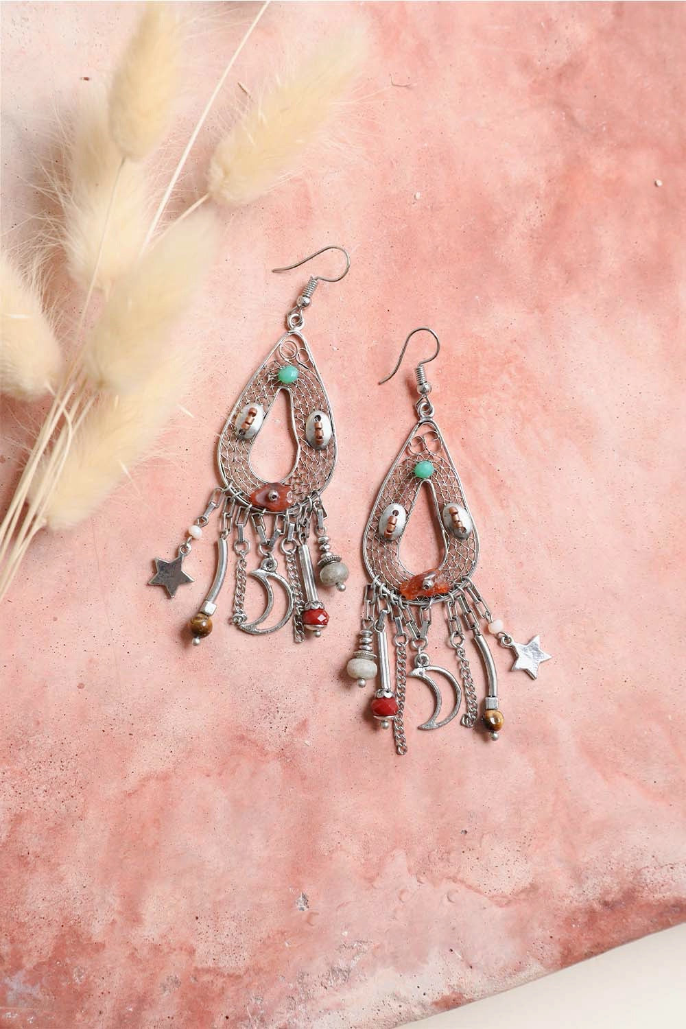 A pair of elegant Carnelian Stones Beaded Earrings showcasing vibrant orange-red stones on a delicate beaded design.