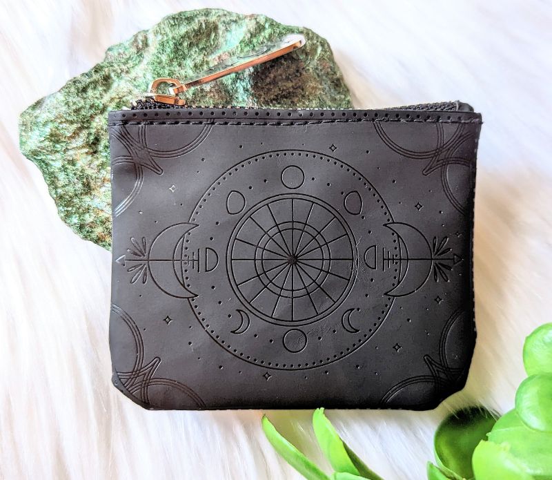 Celestial Magic Coin Purse made of embossed vegan leather with a silver-tone zipper featuring a celestial design.