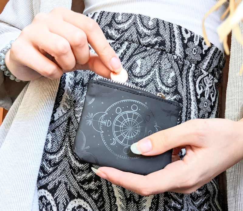 Celestial Magic Coin Purse made of embossed vegan leather with a silver-tone zipper featuring a celestial design.