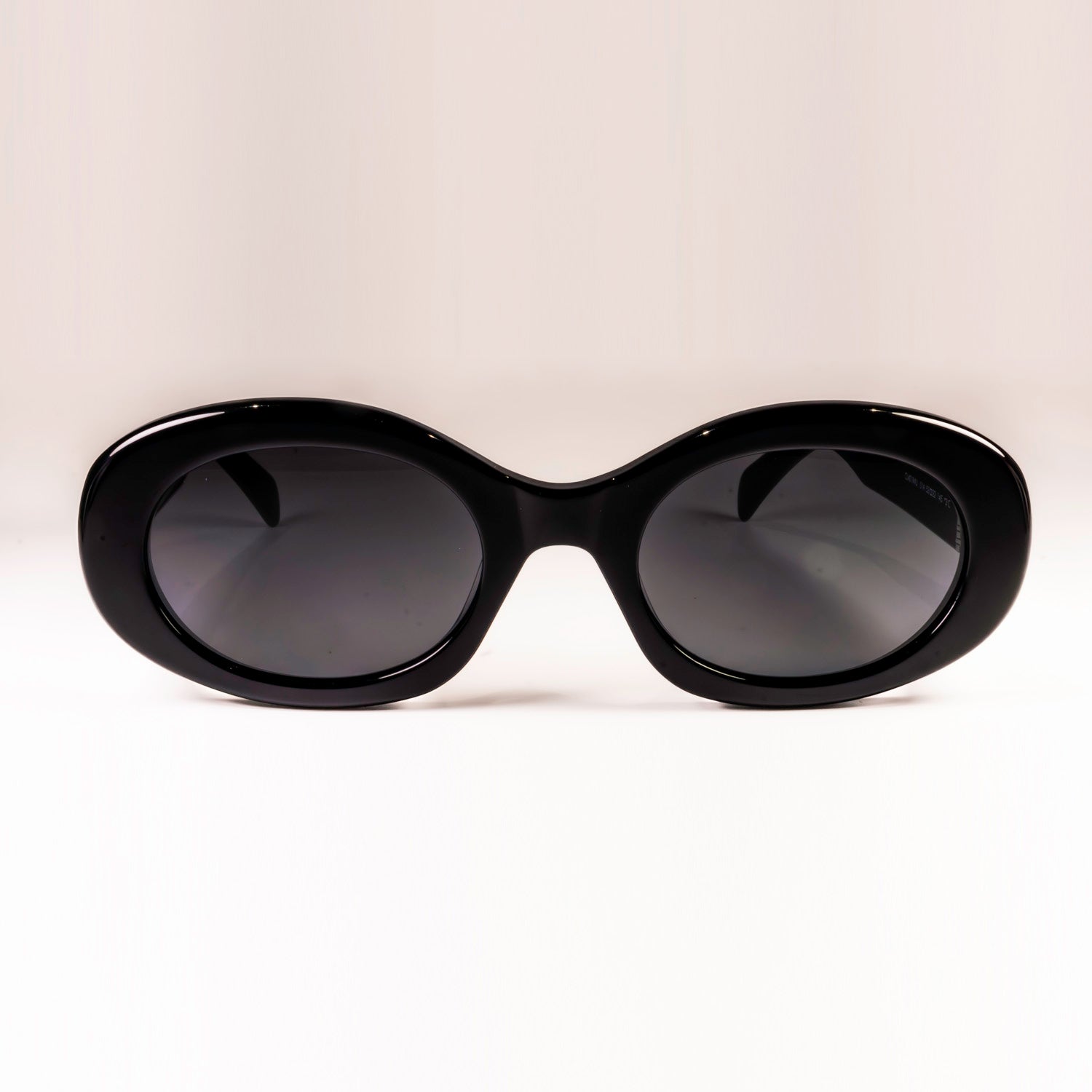 Celine CL40194U Sunglasses featuring a full rim round frame made of acetate, showcasing a stylish and elegant design.