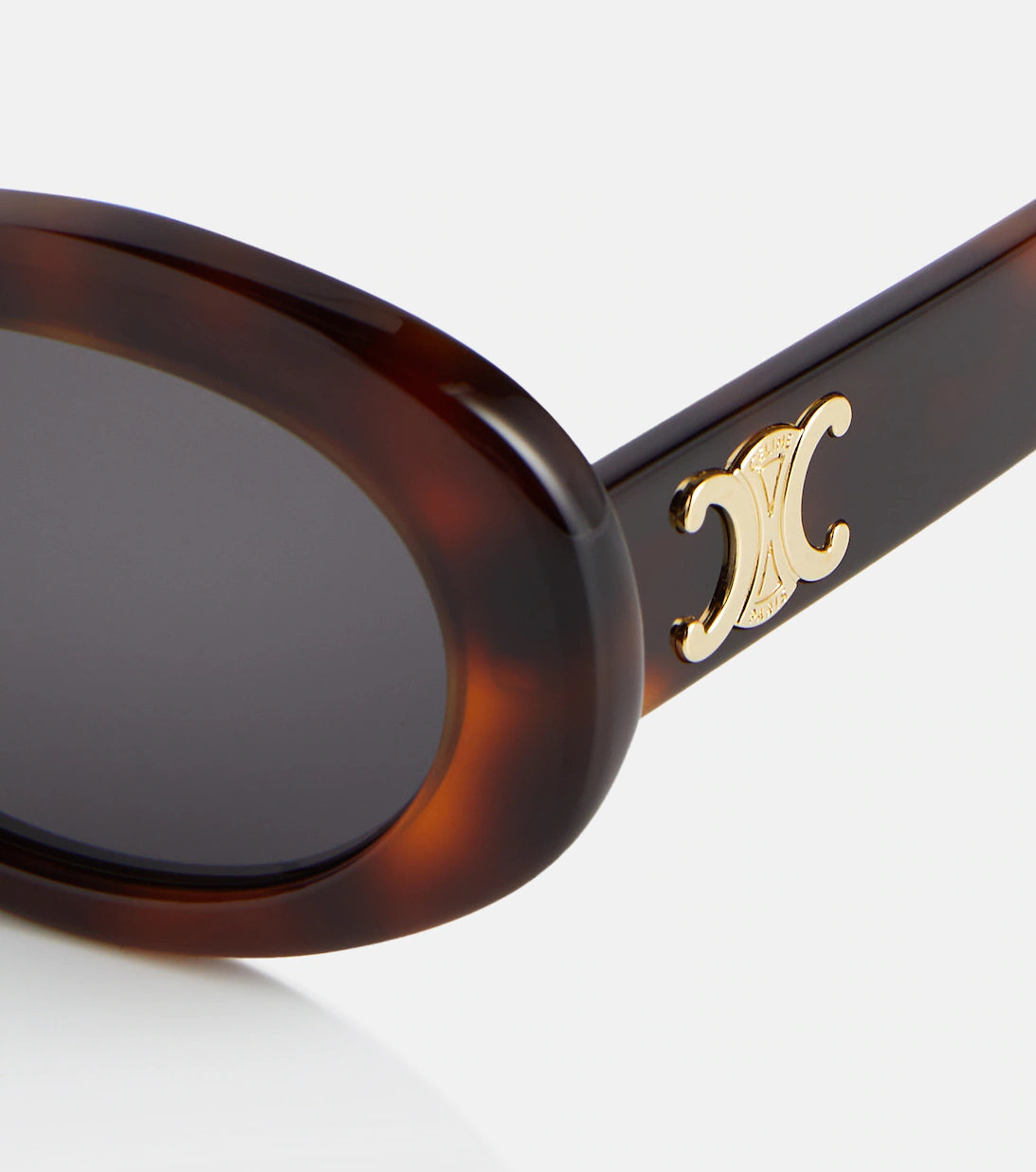 Celine CL40194U Sunglasses featuring a full rim round frame made of acetate, showcasing a stylish and elegant design.