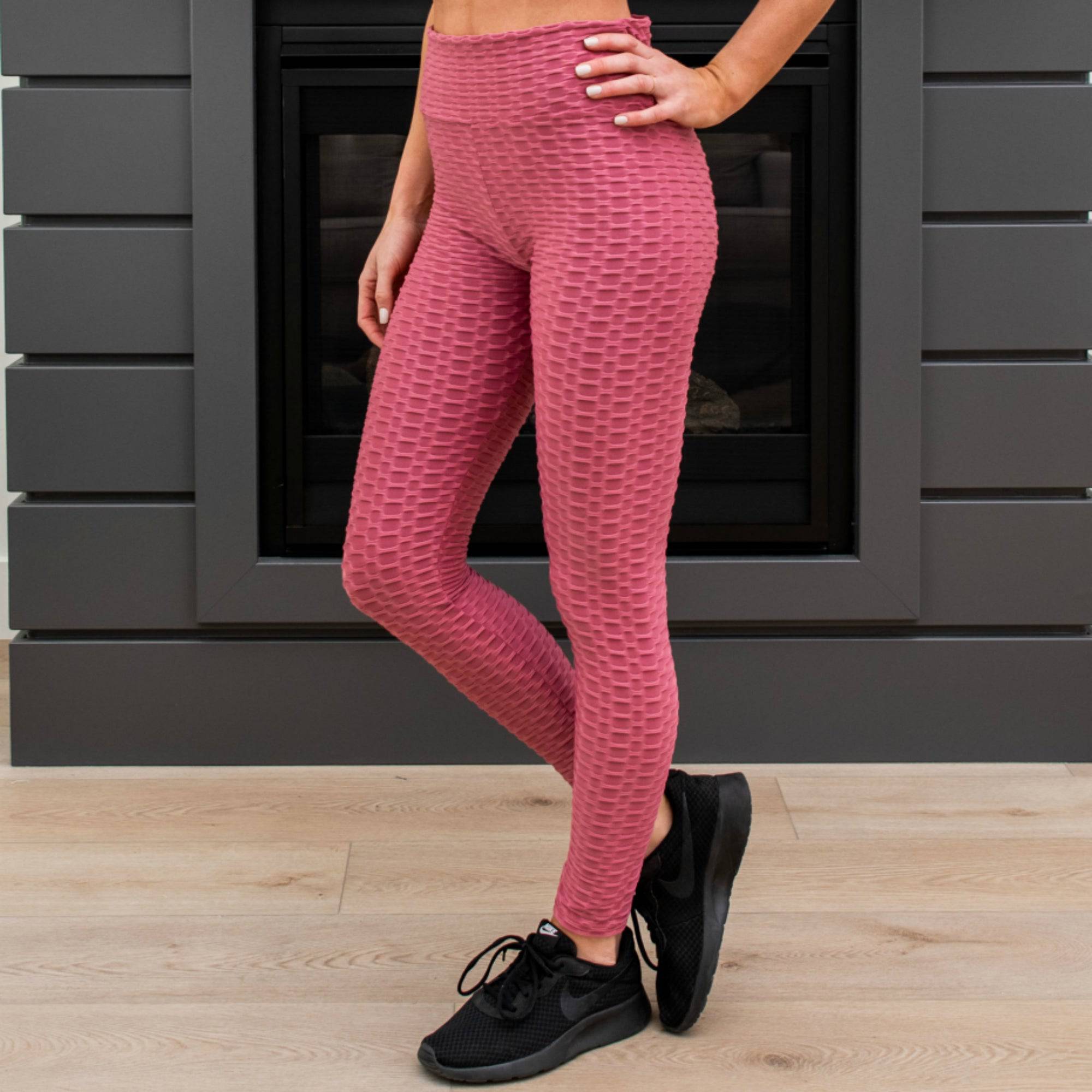 A pair of stylish Cellulite Hiding Leggings in a textured fabric, designed for comfort and coverage, showcasing their long length and flattering fit.