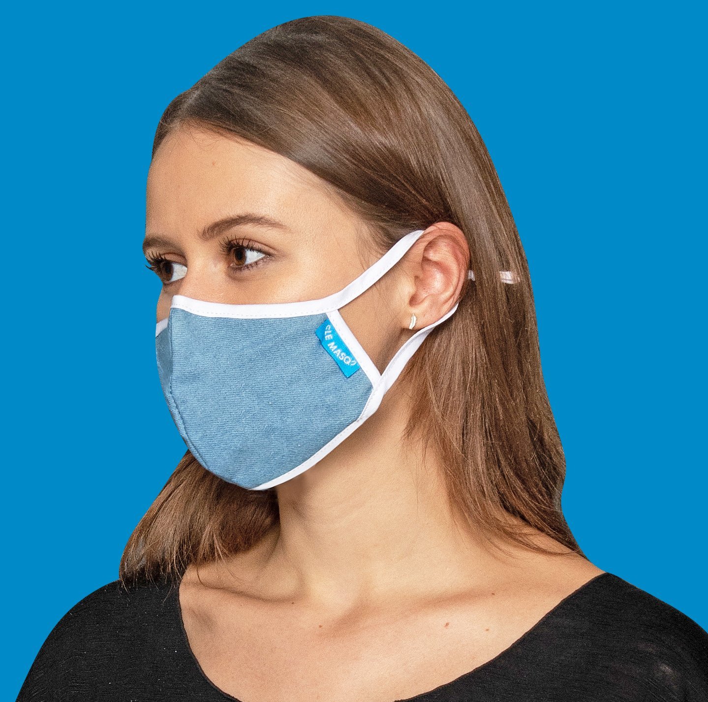 Chambray Denim Mask featuring a breathable fabric, adjustable ear toggles, and a removable inner layer for added comfort.