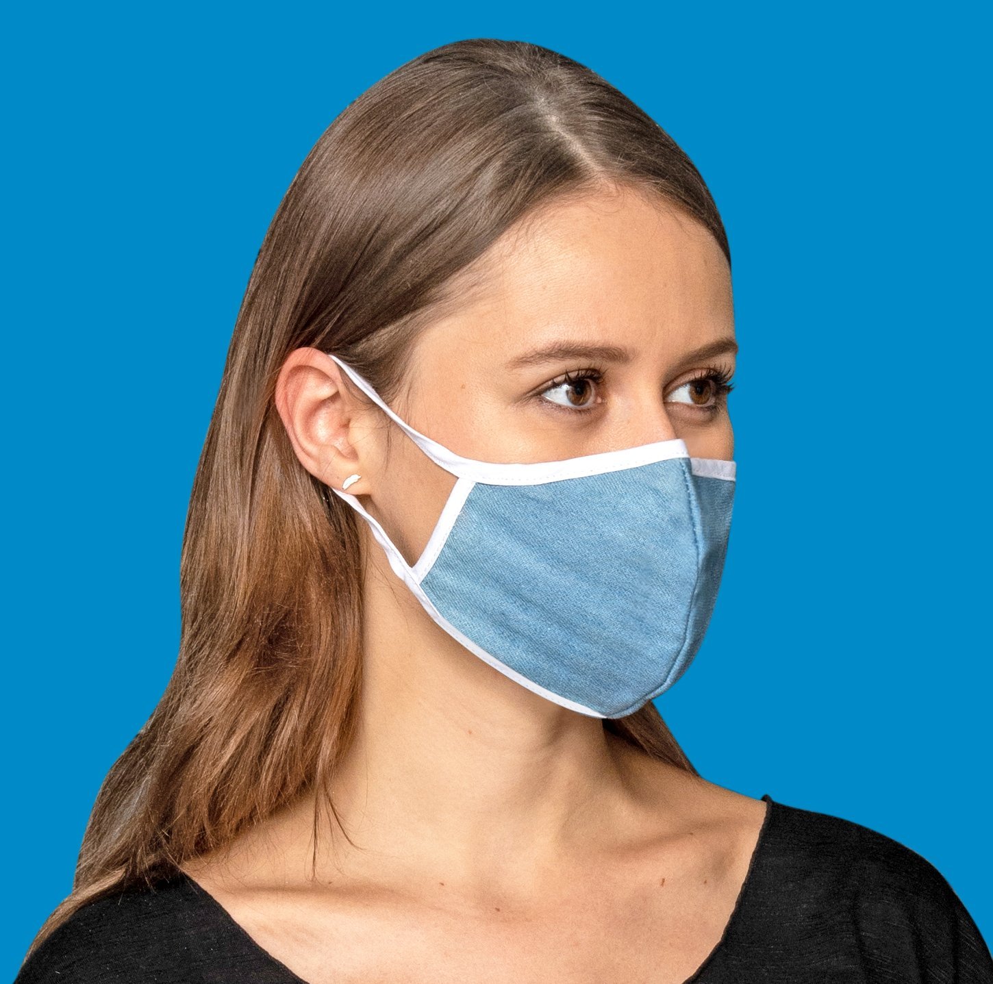 Chambray Denim Mask featuring a breathable fabric, adjustable ear toggles, and a removable inner layer for added comfort.