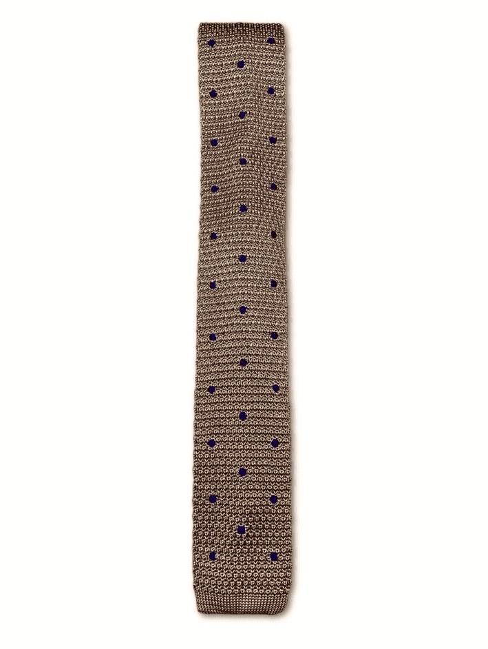 Champagne silk knitted tie with navy blue polka dots, featuring a square end design and a width of 6cm.