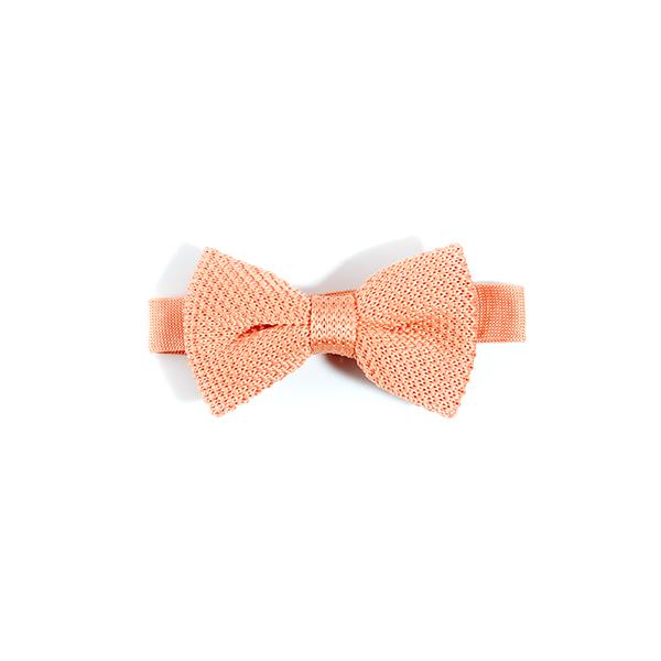 Children's coral fusion knitted bow tie, featuring a vibrant color and soft texture, perfect for ages 2-11.