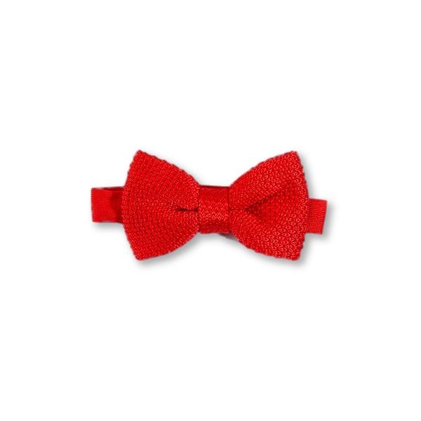 Children's pillar box red knitted bow tie, featuring a vibrant color and classic design, suitable for ages 2 to 11.