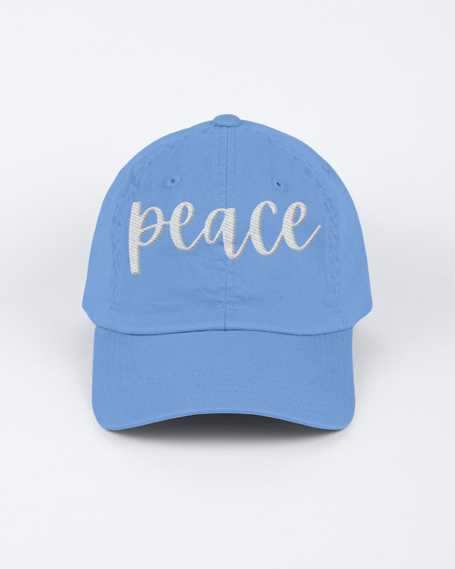 Chino Cap featuring a peace embroidered graphic, made from 100% chino cotton twill, showcasing a low-profile design.