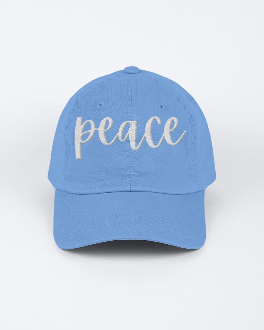 Chino Cap featuring a peace embroidered graphic, made from 100% chino cotton twill, showcasing a low-profile design.