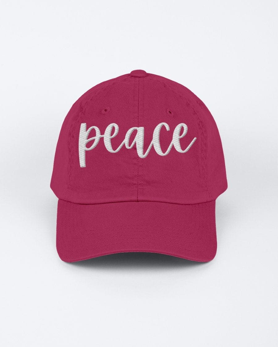 Chino Cap featuring a peace embroidered graphic, made from 100% chino cotton twill, showcasing a low-profile design.