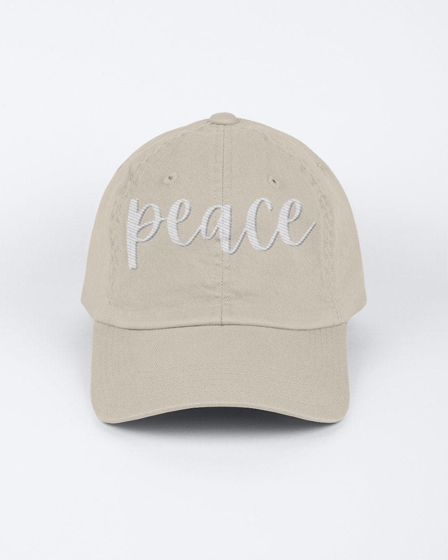 Chino Cap featuring a peace embroidered graphic, made from 100% chino cotton twill, showcasing a low-profile design.