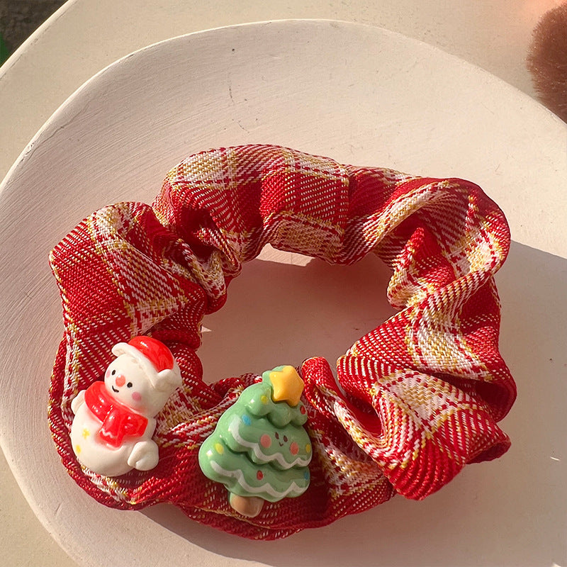 A luxurious Christmas Red Velvet Hair Tie, perfect for festive hairstyles, showcasing its rich red color and soft texture.