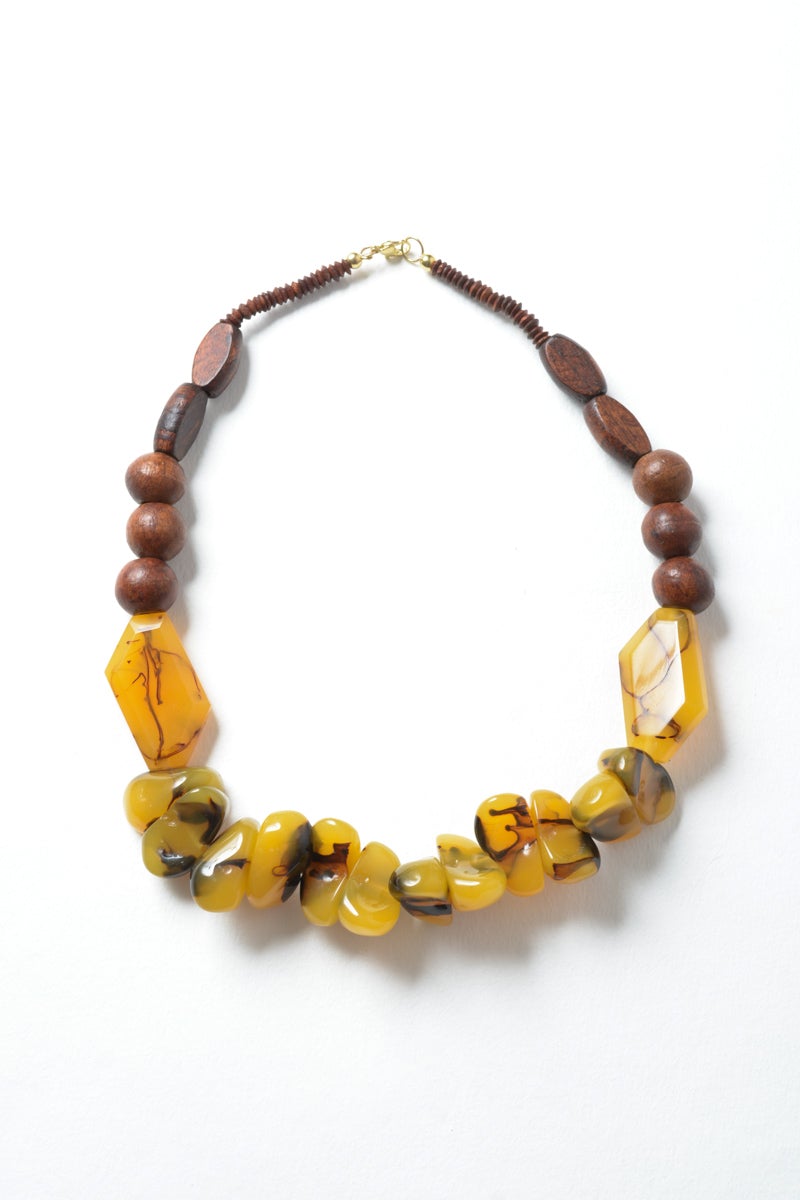 Chunky amber resin beaded necklace featuring vibrant, colorful beads, perfect for adding style to any outfit.