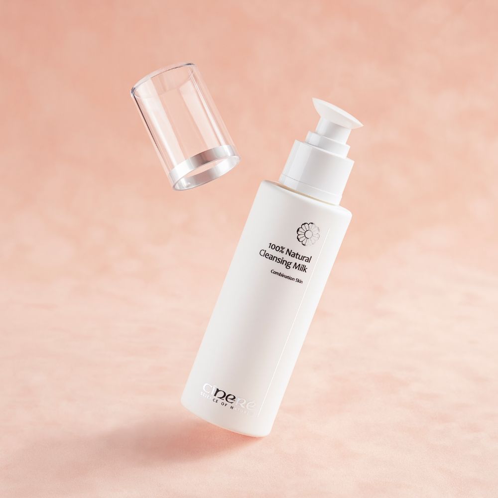 Bottle of Cinere 100% Natural Cleansing Milk 150ml with a smooth texture, ideal for gentle makeup removal.