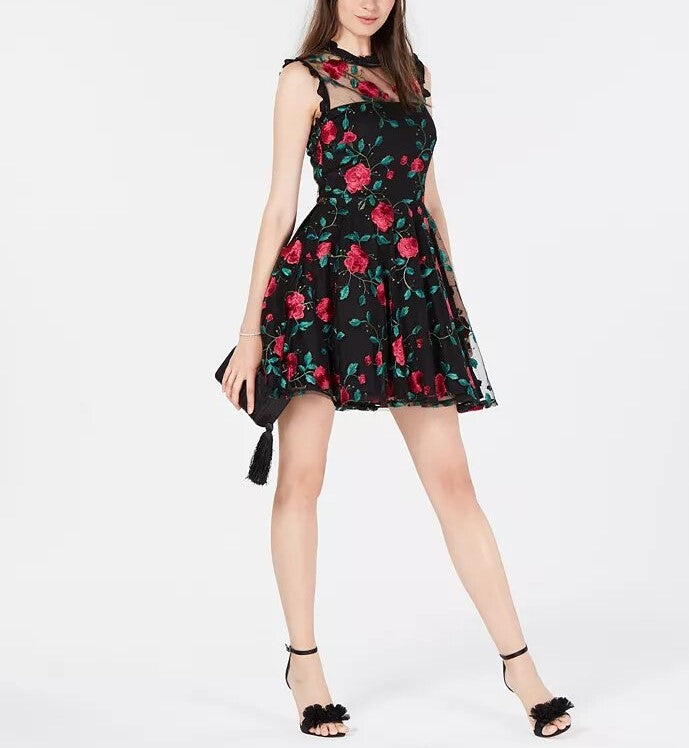 City Studios Juniors' Floral-Embroidered Illusion Dress featuring floral embroidery, scoop neckline, and ruffle trim.