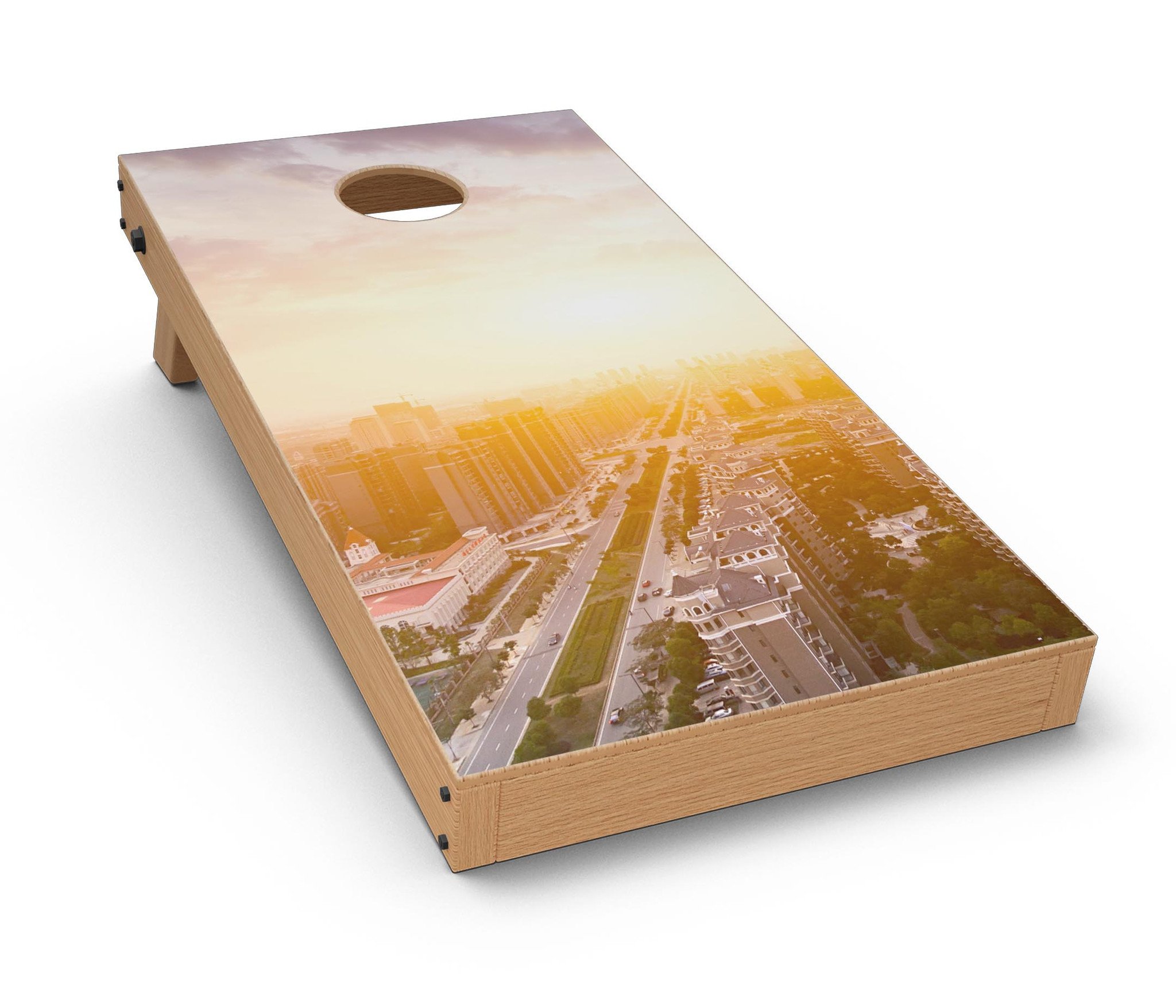 Cityscape at Sunset CornHole Board Skin Decal Kit showcasing vibrant sunset colors and city skyline design, perfect for customizing Cornhole boards.