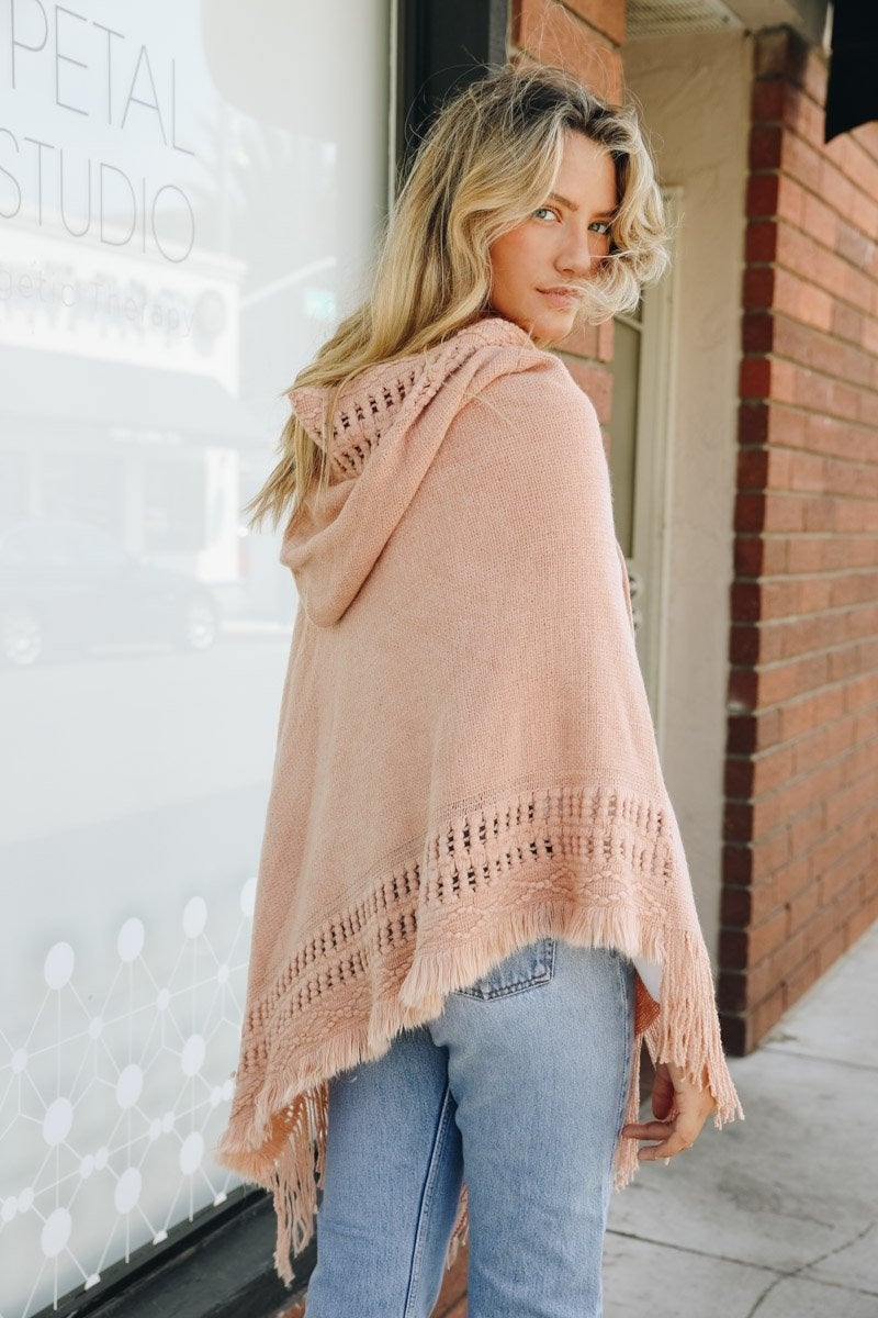 A stylish Classic Knit Hooded Poncho in a cozy knit fabric, featuring a hood and a loose fit, perfect for casual or dressy outfits.