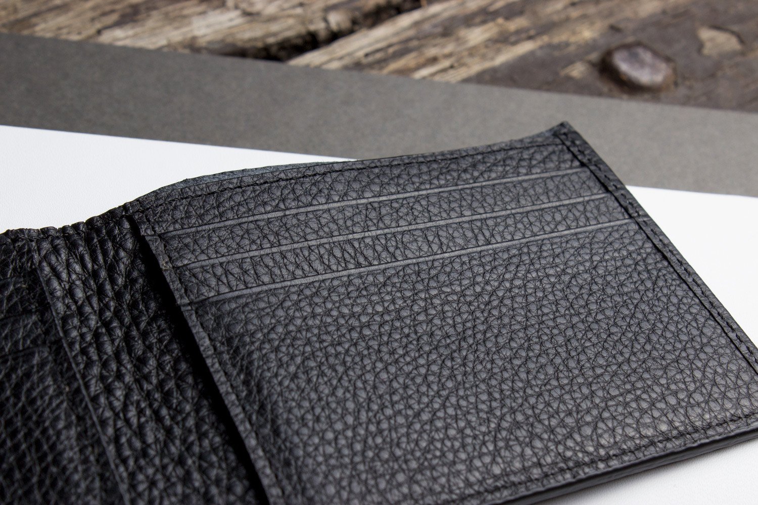 Classic Leather Wallet made from pebbled top grain cowhide with 6 card slots and contrast stitching.