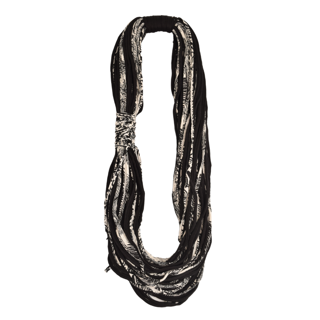 Classic Shreds Neckwear featuring a side-tie design made from upcycled textiles, showcasing its elegant drape and lightweight feel.