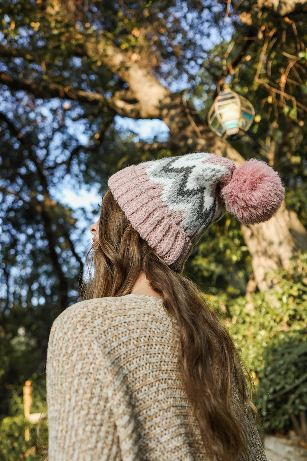 Classic Winter Pom Beanie with shaggy lining in vibrant colors, perfect for winter wear.