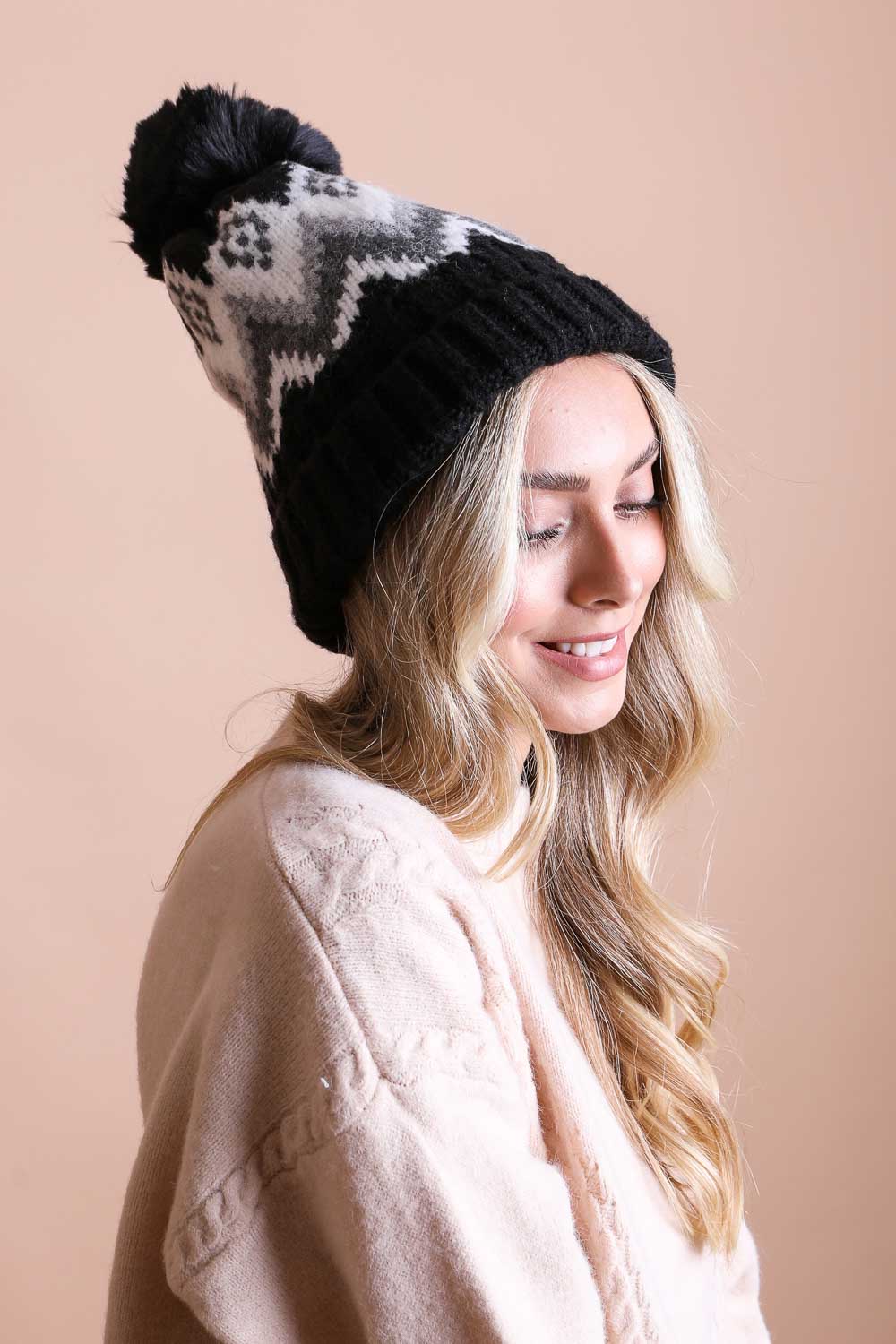 Classic Winter Pom Beanie with shaggy lining in vibrant colors, perfect for winter wear.