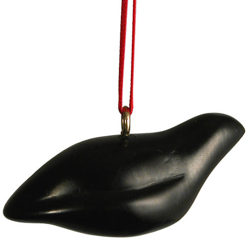 Handcrafted Coal Dove Ornament with red ribbon, symbolizing hope and fair trade.