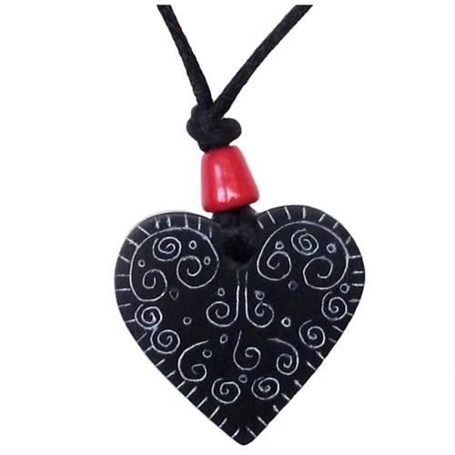 Handcrafted Coal Heart Pendant with Swirls, showcasing a unique design and polished finish, suspended on a black cord.