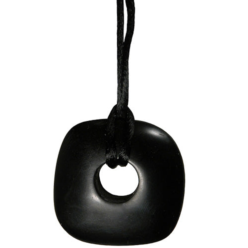 Coal Unity Loop Pendant, handcrafted from natural coal, suspended on a black cord, showcasing unique artisan craftsmanship.