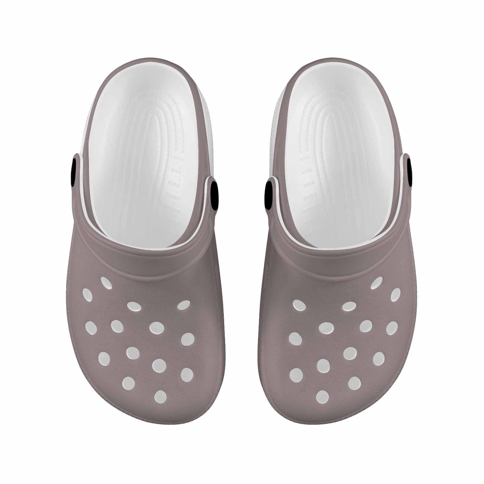 Coffee brown clogs designed for youth, featuring a slip-on design and cushioned sole for comfort and support.