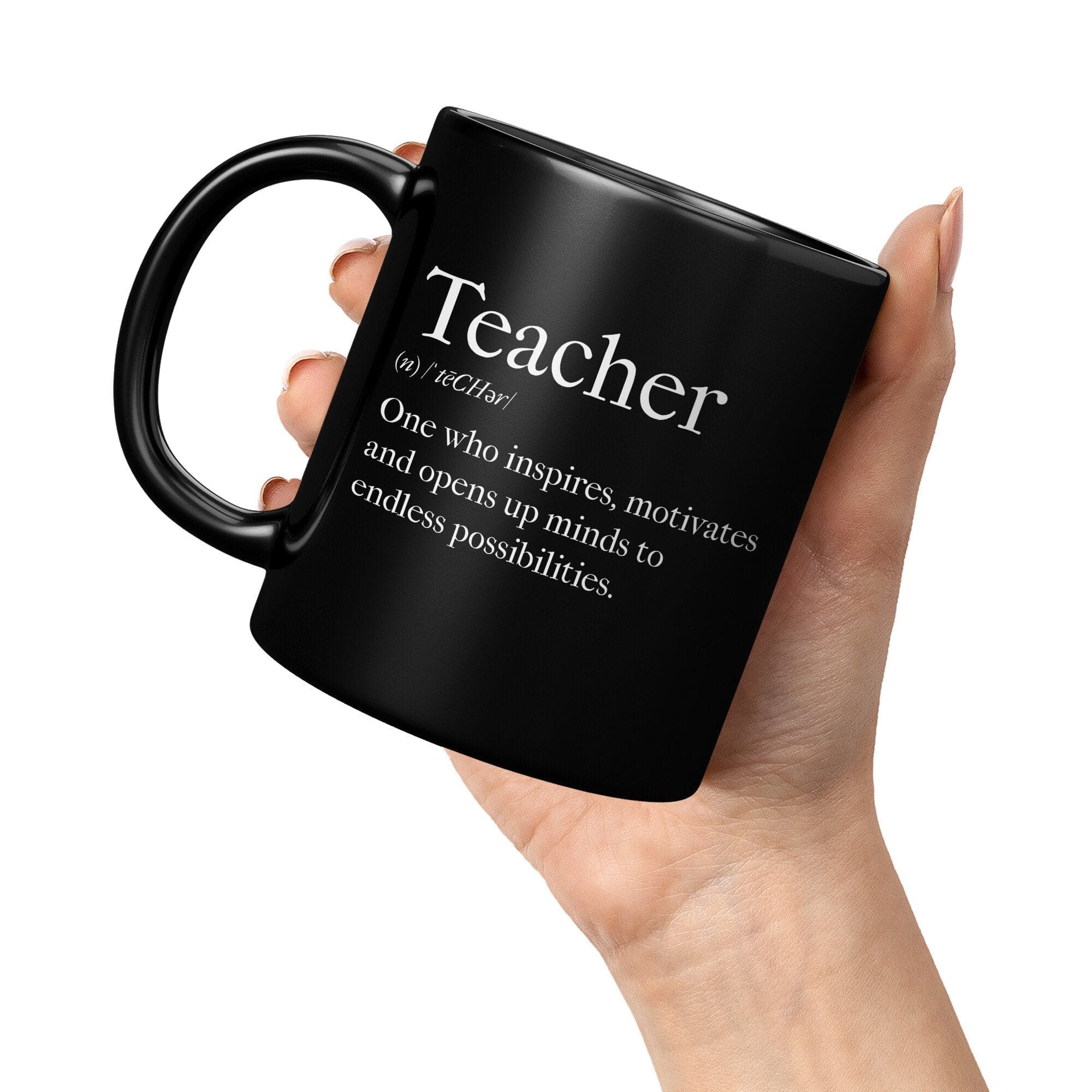 A glossy black ceramic mug with the phrase 'Teachers Inspire' printed on it, showcasing its elegant design and vibrant color.