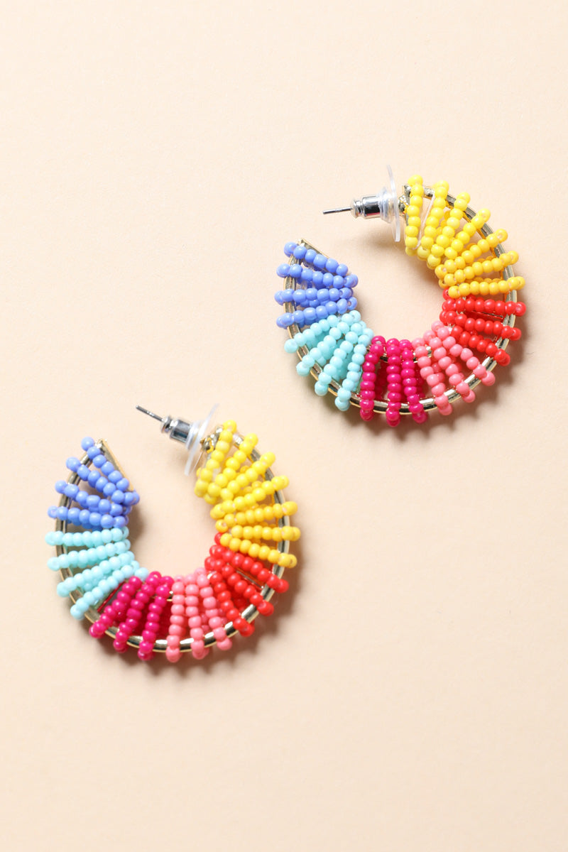 Colorful Beaded Hoop Earrings featuring a vibrant array of beads in a hoop design, perfect for adding flair to any outfit.