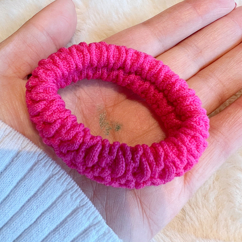 Colorful High Elastic Hair Tie in various vibrant colors, showcasing its stretchy and stylish design.