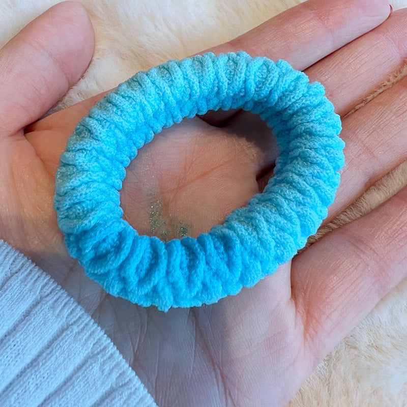 Colorful High Elastic Hair Tie in various vibrant colors, showcasing its stretchy and stylish design.