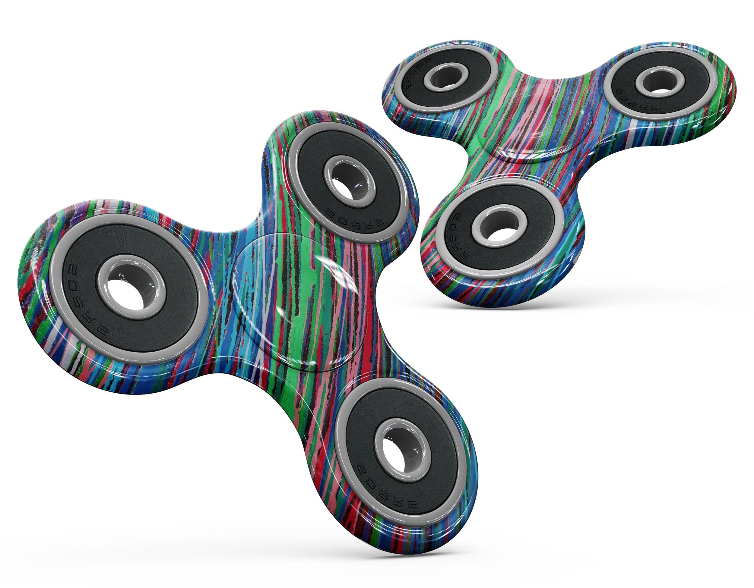 Colorful Strokes Full-Body Fidget Spinner Skin-Kit showcasing vibrant designs and premium vinyl material.