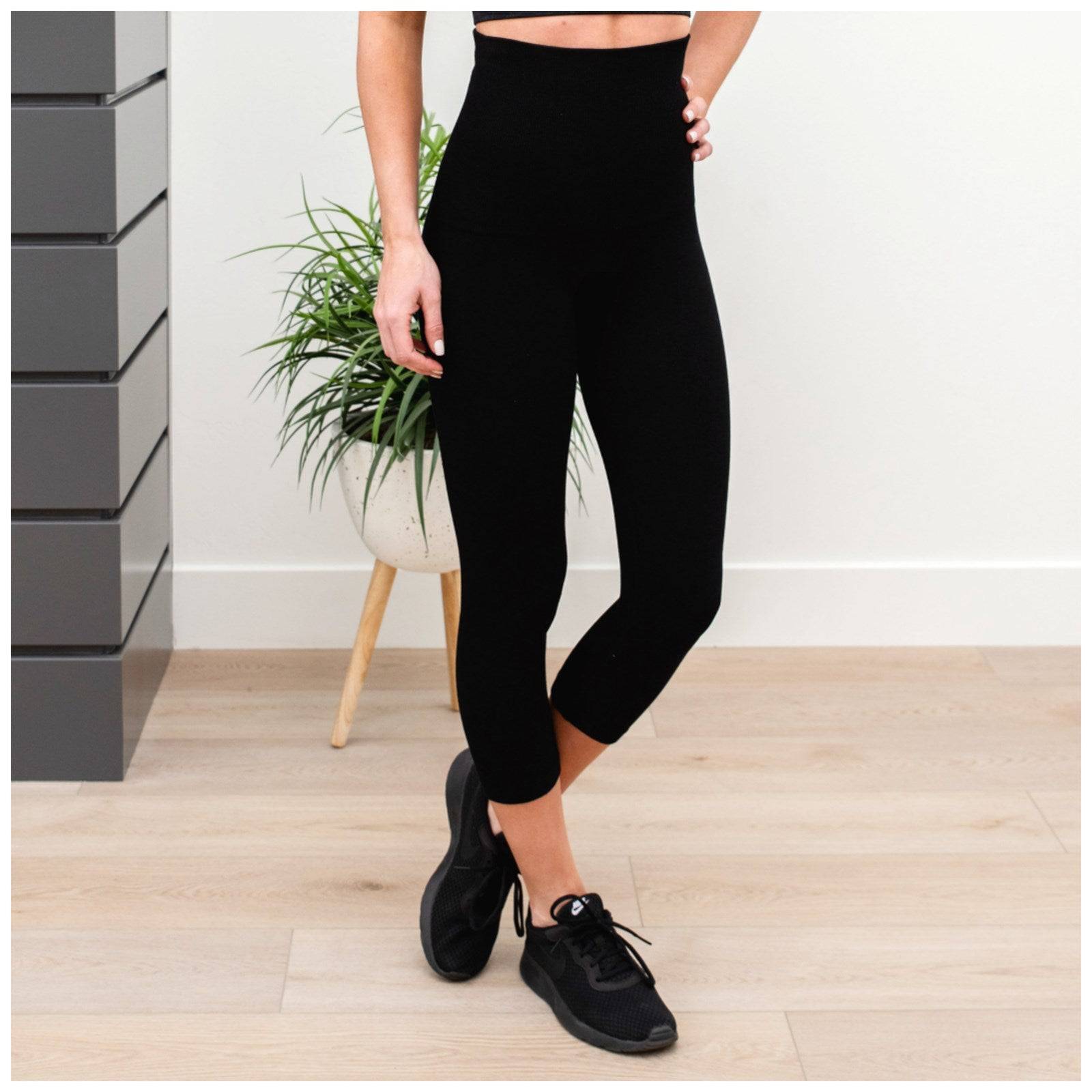 Yelete Compression Non-Lined Capri Leggings featuring a tall waistband and non-lined fabric, perfect for comfort and support.