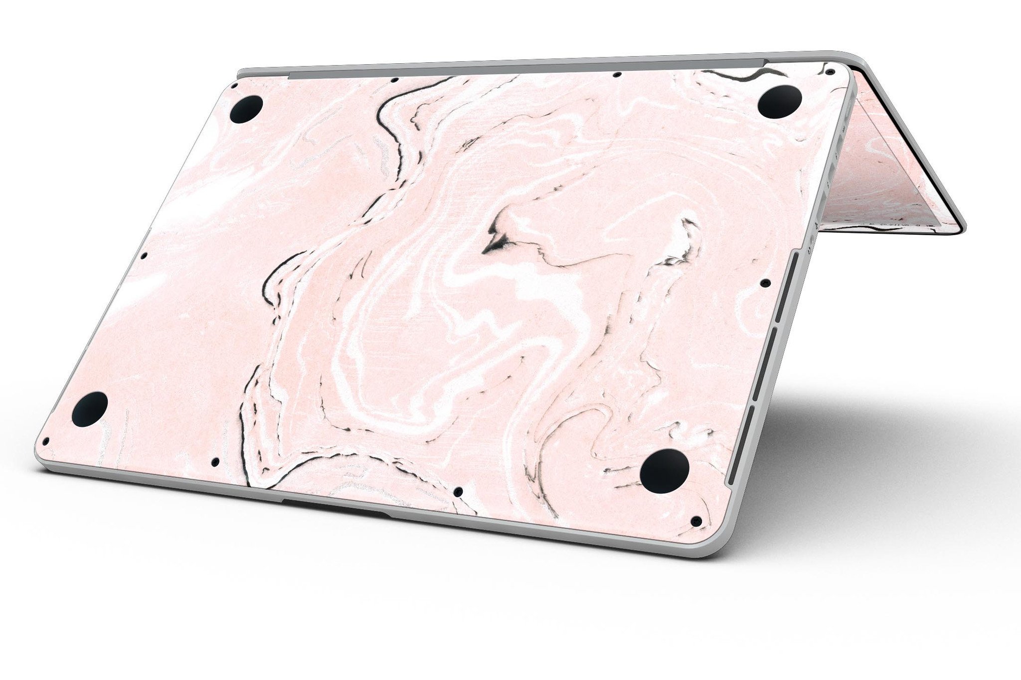 Coral 19 Textured Marble skin applied to a MacBook Pro with Retina Display, showcasing its vibrant design and sleek finish.