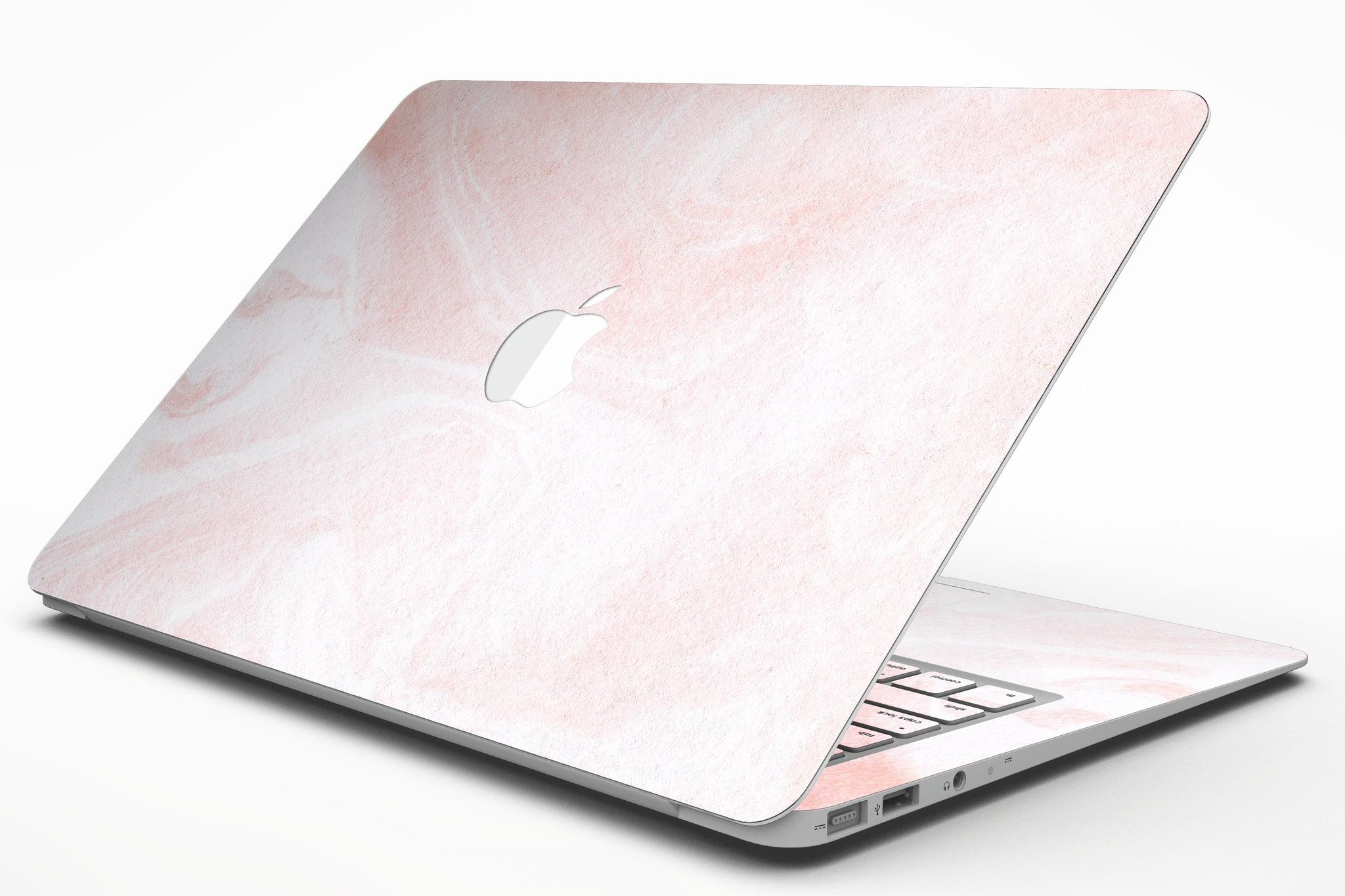 Coral 39 Textured Marble Skin Kit for MacBook Air, showcasing a stylish marble design with a premium vinyl finish.