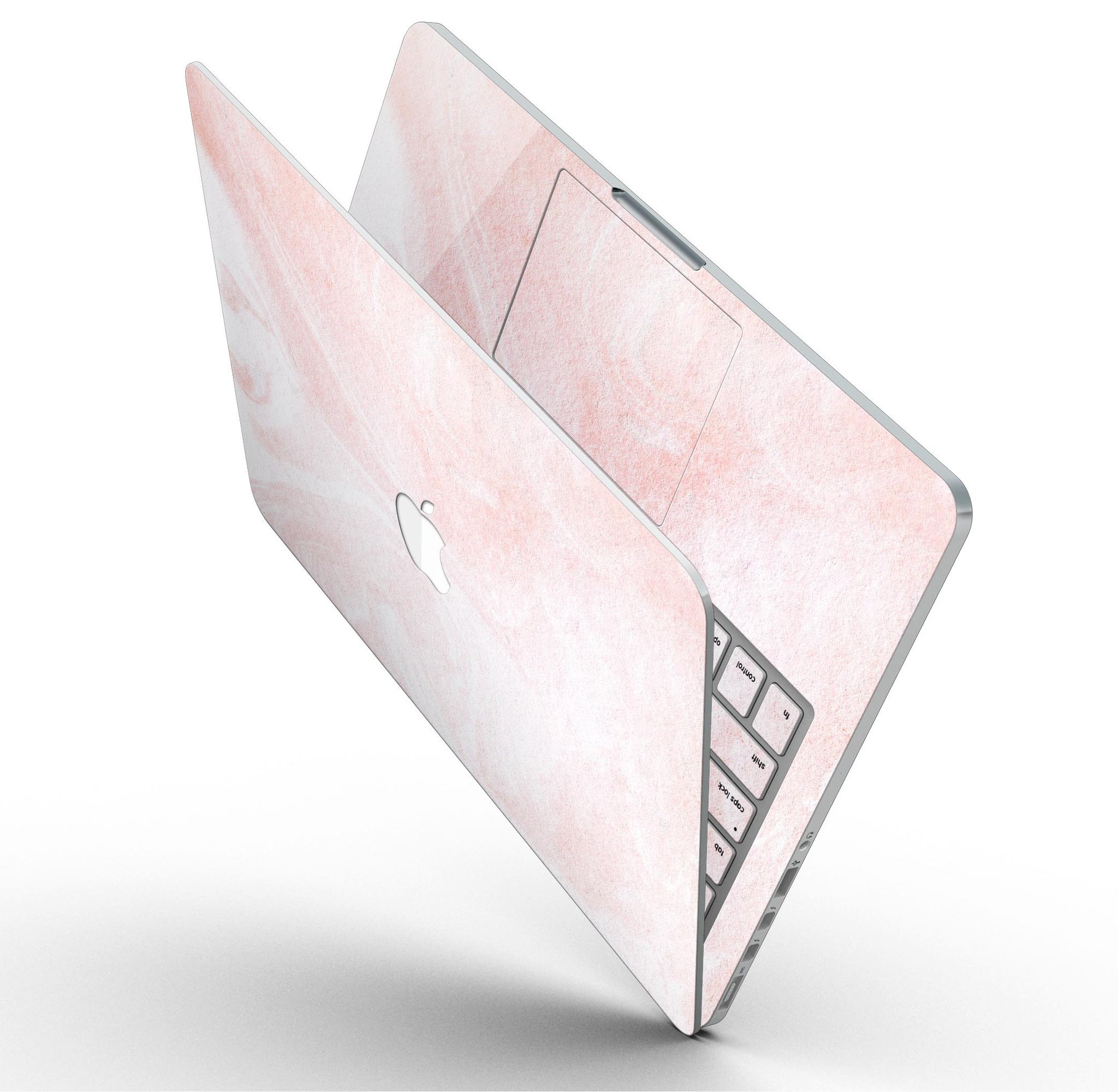 Coral 39 Textured Marble skin applied to a MacBook Pro with Retina Display, showcasing its stylish design and premium finish.