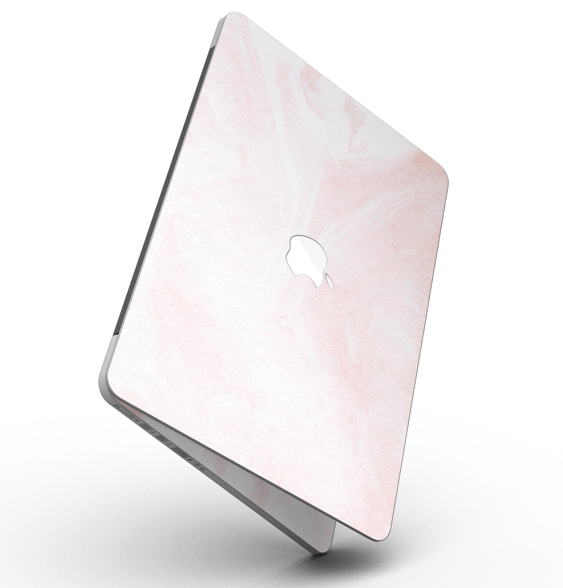 Coral 39 Textured Marble skin applied to a MacBook Pro with Retina Display, showcasing its stylish design and premium finish.