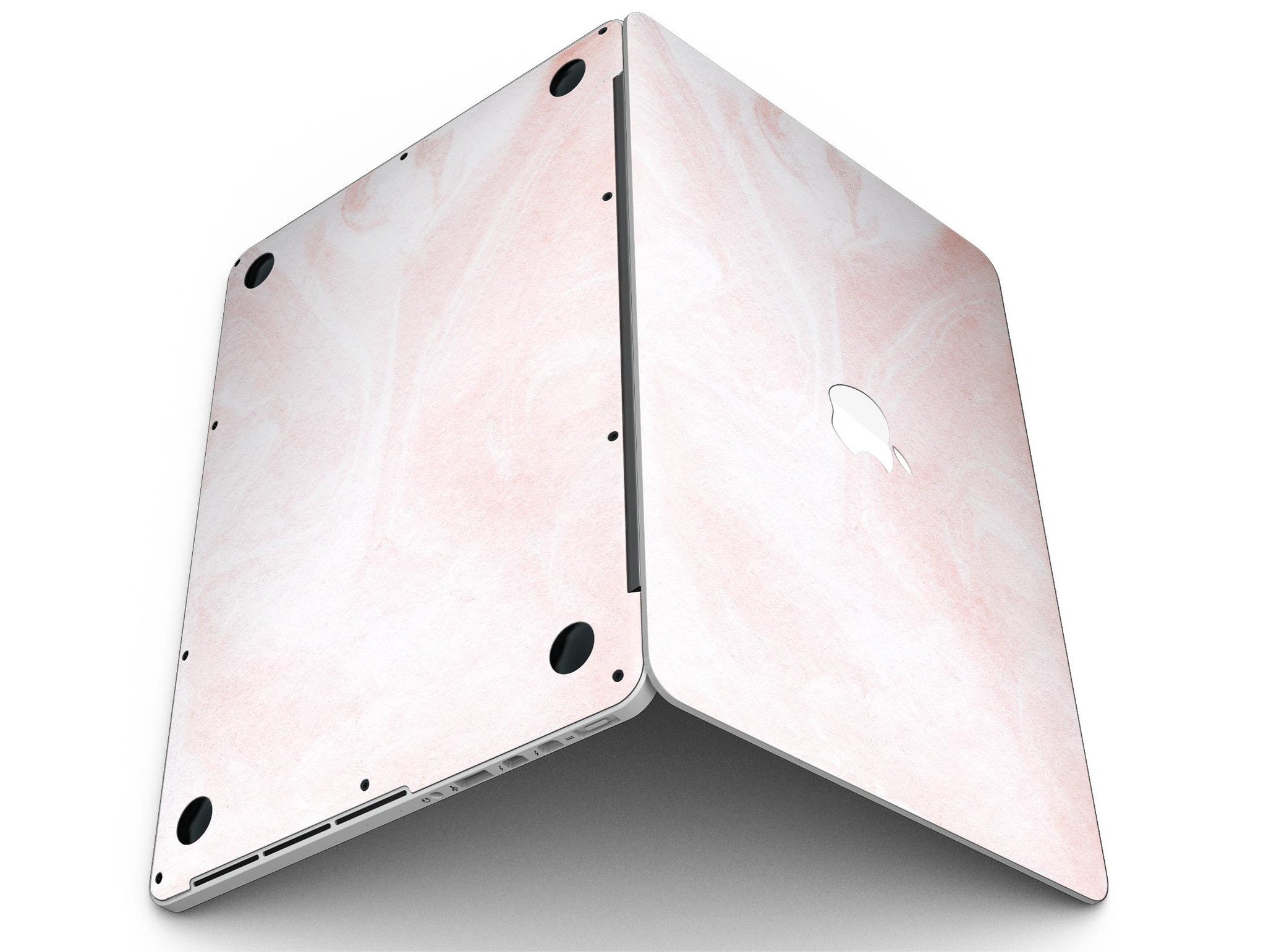 Coral 39 Textured Marble skin applied to a MacBook Pro with Retina Display, showcasing its stylish design and premium finish.