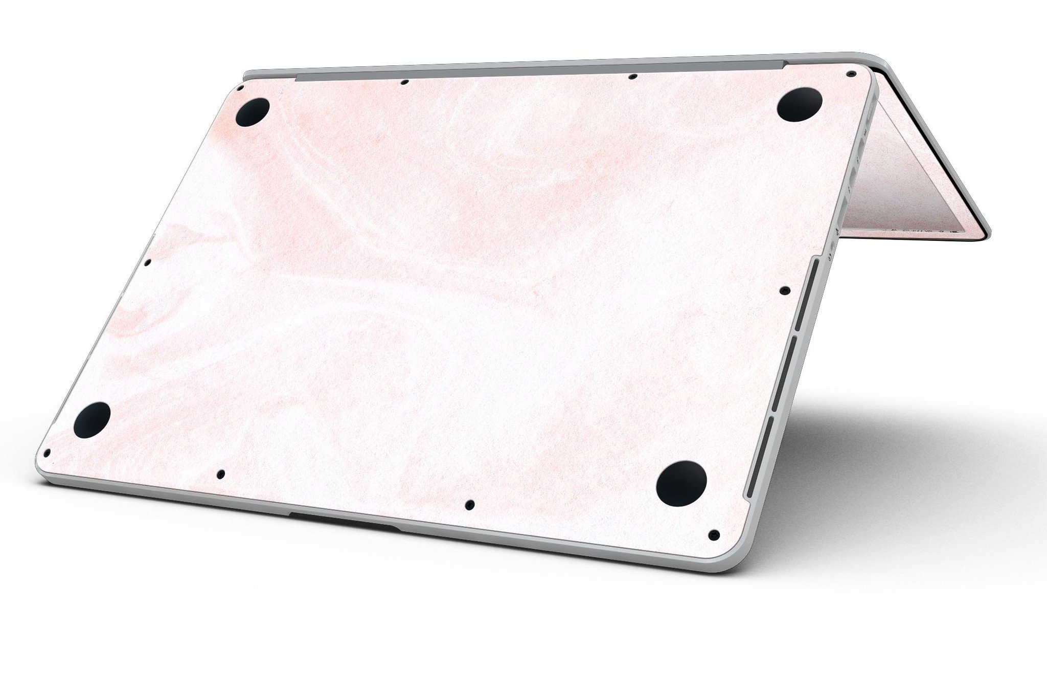 Coral 39 Textured Marble skin applied to a MacBook Pro with Retina Display, showcasing its stylish design and premium finish.