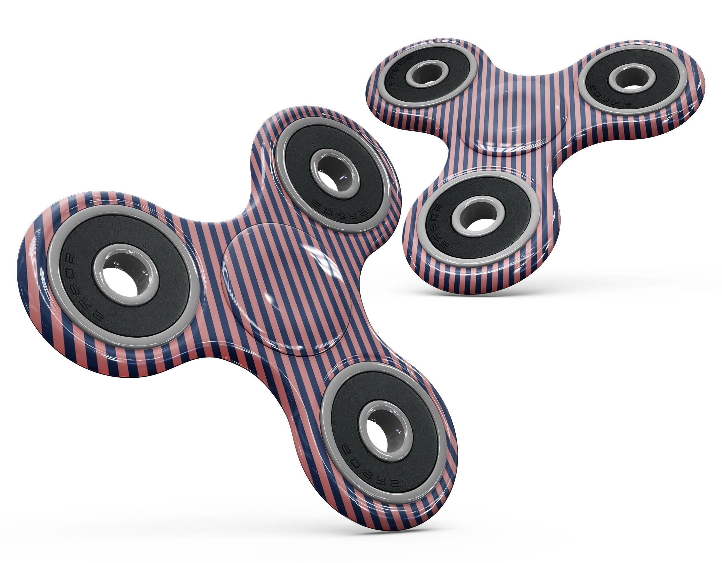 Coral and navy blue diagonal stripes skin kit for fidget spinner, showcasing vibrant colors and a sleek design.