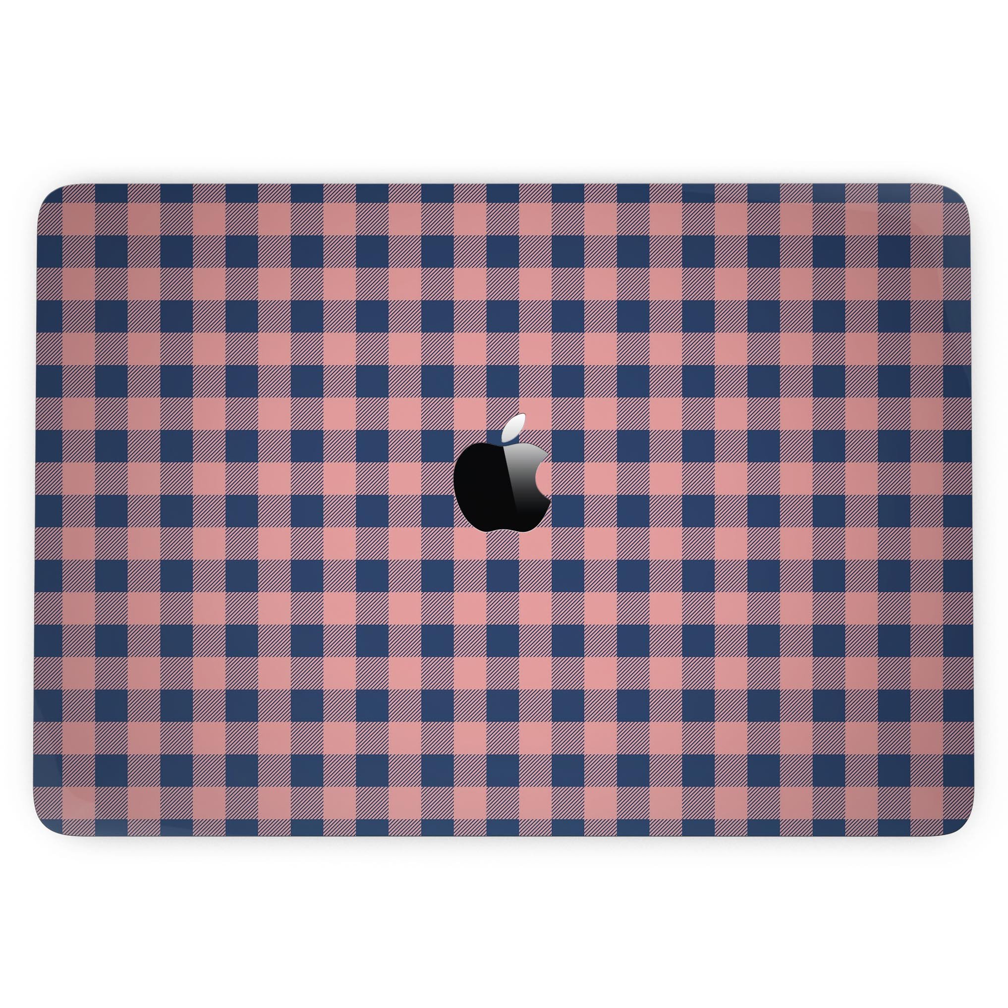 Coral and navy plaid pattern skin for a 13-inch MacBook Pro without Touch Bar, showcasing vibrant colors and a sleek design.