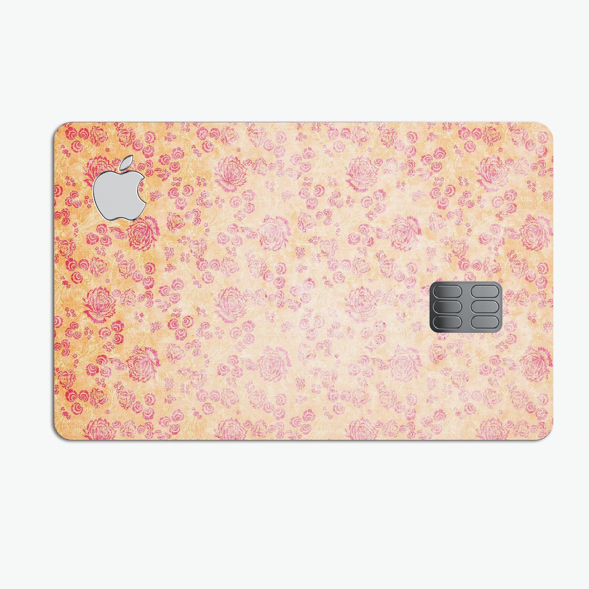 Coral and pink faded flower field decal skin for Apple Card, showcasing vibrant floral design and premium vinyl material.