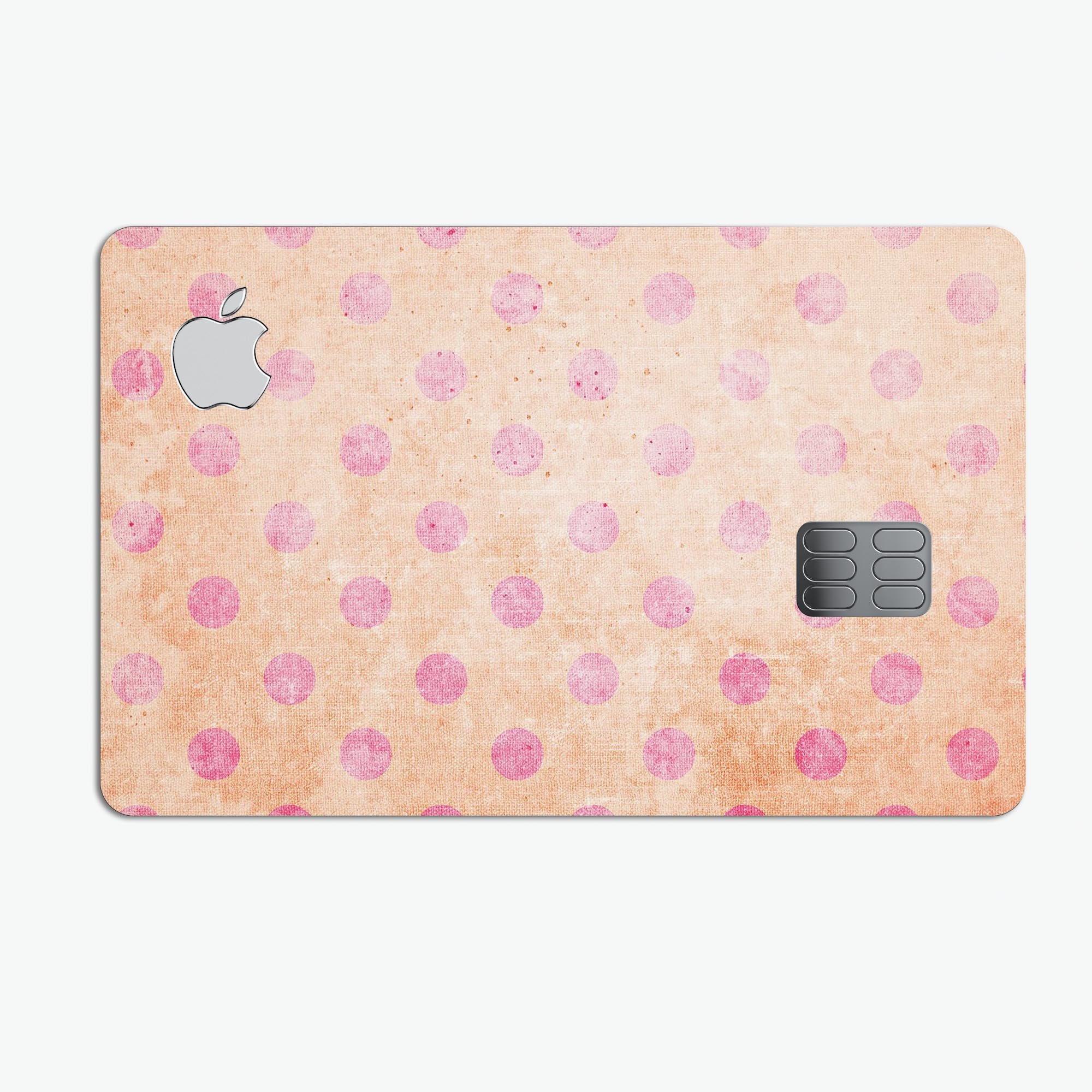 Coral and pink scratched polka dots protective decal for Apple Card, showcasing vibrant colors and stylish design.