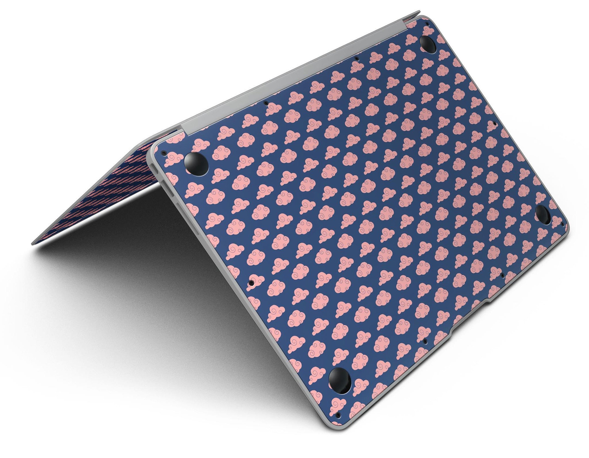 Coral Micro Cloud Swirls skin kit for MacBook Air, showcasing vibrant coral patterns over a navy background.