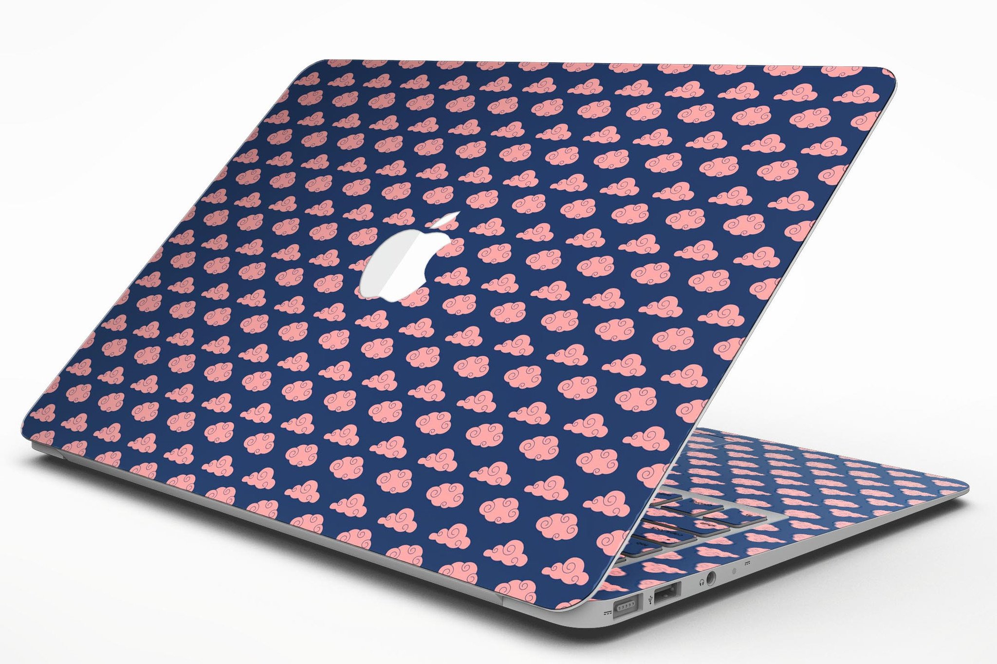 Coral Micro Cloud Swirls skin kit for MacBook Air, showcasing vibrant coral patterns over a navy background.